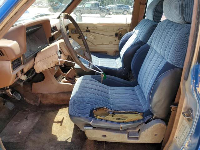 1N6ND06Y9EC346901 - 1984 DATSUN 720 KING CAB 4X4 BLUE photo 7