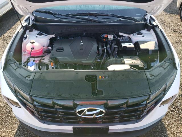 5NMJACAE6PH233579 - 2023 HYUNDAI TUCSON SE WHITE photo 11