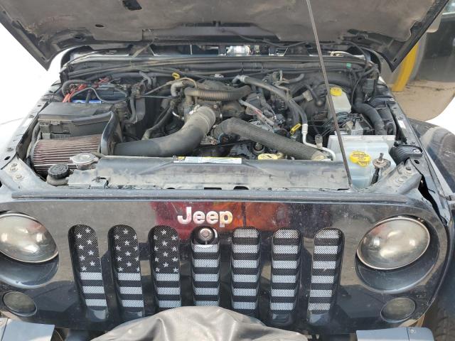 1J4BA5H1XAL115764 - 2010 JEEP WRANGLER U SAHARA BLACK photo 12