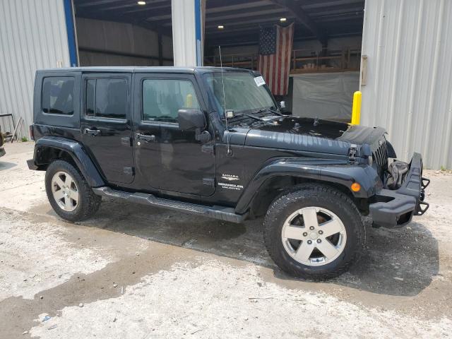 1J4BA5H1XAL115764 - 2010 JEEP WRANGLER U SAHARA BLACK photo 4