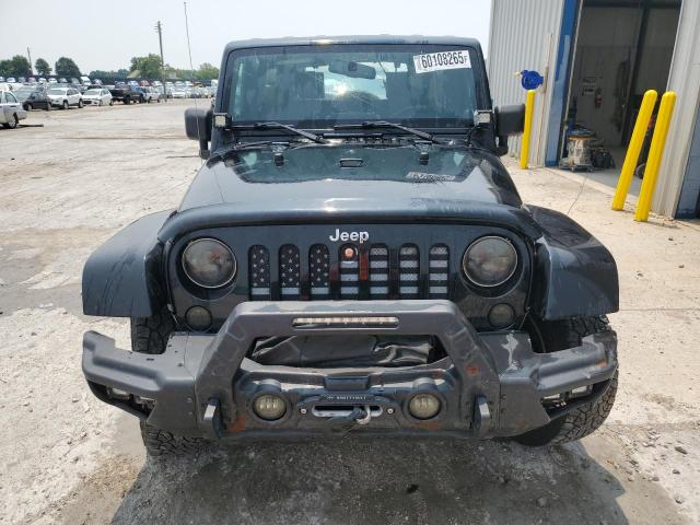 1J4BA5H1XAL115764 - 2010 JEEP WRANGLER U SAHARA BLACK photo 5