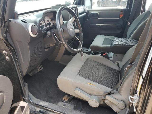 1J4BA5H1XAL115764 - 2010 JEEP WRANGLER U SAHARA BLACK photo 7