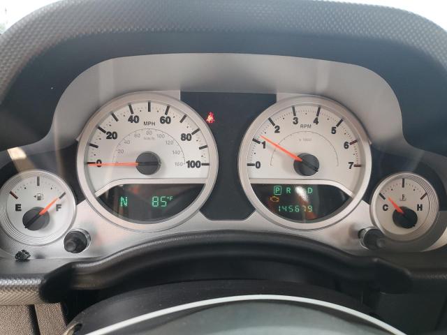 1J4BA5H1XAL115764 - 2010 JEEP WRANGLER U SAHARA BLACK photo 9