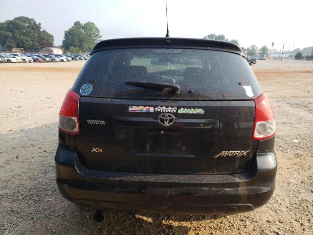 2T1KR32E54C309225 - 2004 TOYOTA MATRIX XR Schwarz Foto 6