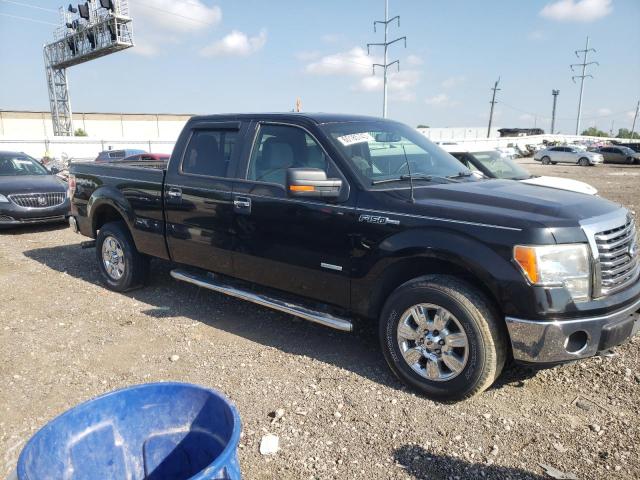 1FTFW1ET5BFC29517 - 2011 FORD F150 SUPERCREW BLACK photo 4