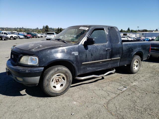 1FTRX18L1XKB69322 - 1999 FORD F-150 BLACK photo 1