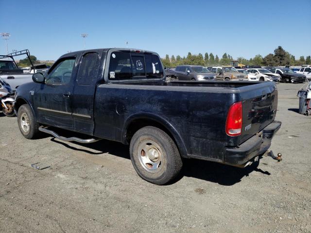 1FTRX18L1XKB69322 - 1999 FORD F-150 BLACK photo 2