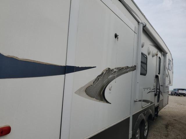 4YDF321259B630852 - 2009 OUTB TRAVEL TRL WHITE photo 4