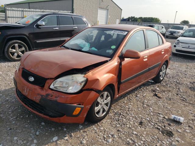 KNADE223196514257 - 2009 KIA RIO BASE ORANGE photo 1