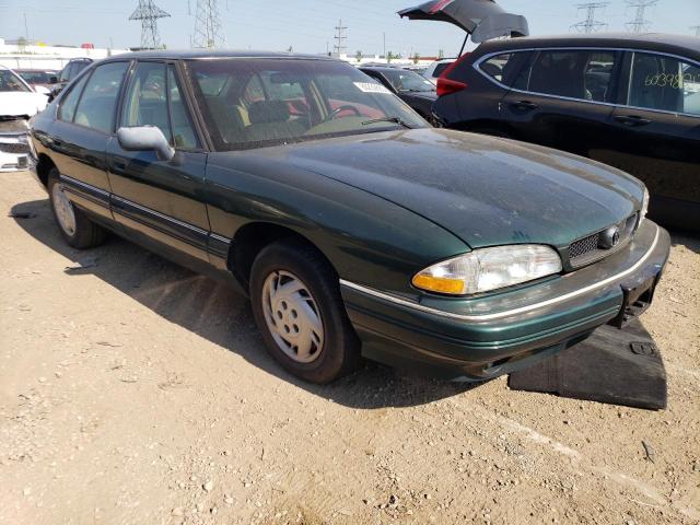 1G2HX52K3S4234787 - 1995 PONTIAC BONNEVILLE SE GREEN photo 4