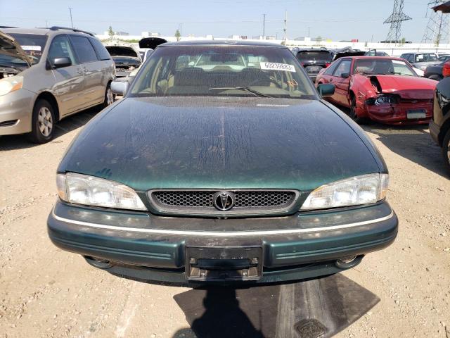 1G2HX52K3S4234787 - 1995 PONTIAC BONNEVILLE SE GREEN photo 5