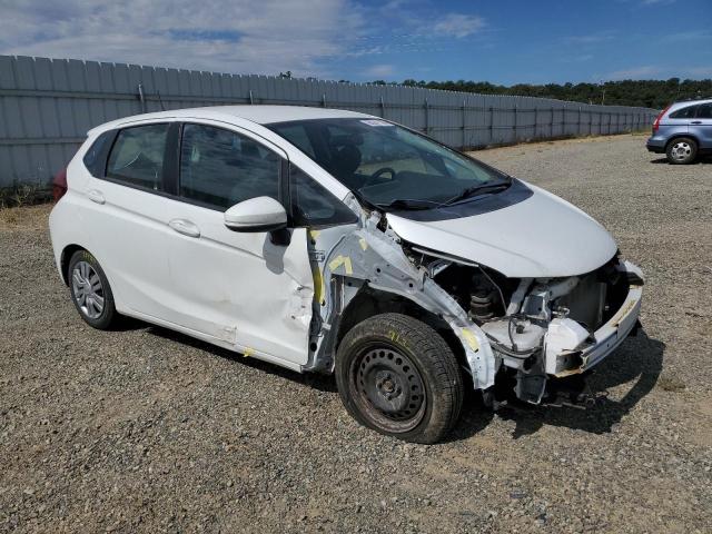 JHMGK5H59GS012618 - 2016 HONDA FIT LX WHITE photo 4