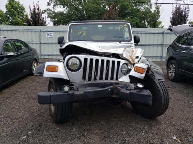 1J4FA69S94P796544 - 2004 JEEP WRANGLER / RUBICON SILVER photo 5