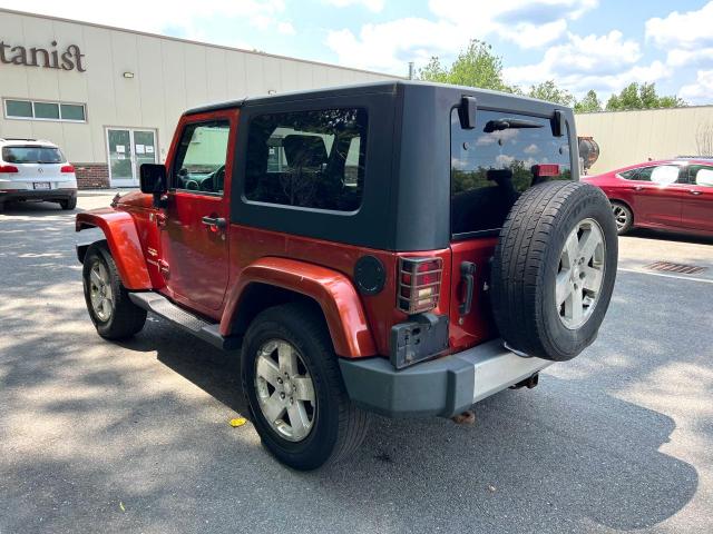 1J4FA541X9L738904 - 2009 JEEP WRANGLER SAHARA ORANGE photo 3