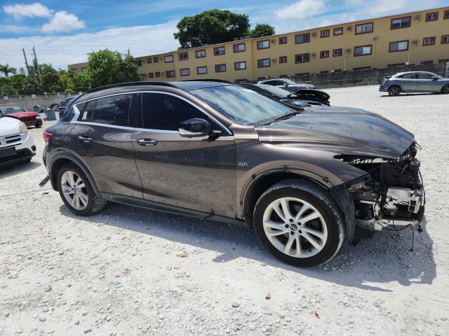 SJKCH5CRXHA023706 - 2017 INFINITI QX30 BASE BROWN photo 4