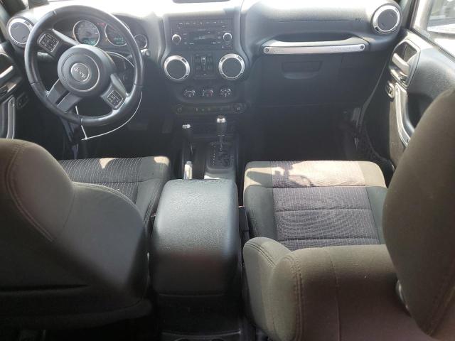 1J4BA5H16BL593875 - 2011 JEEP WRANGLER U SAHARA Silber Foto 8