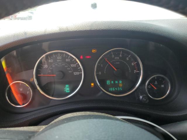 1J4BA5H16BL593875 - 2011 JEEP WRANGLER U SAHARA Silber Foto 9