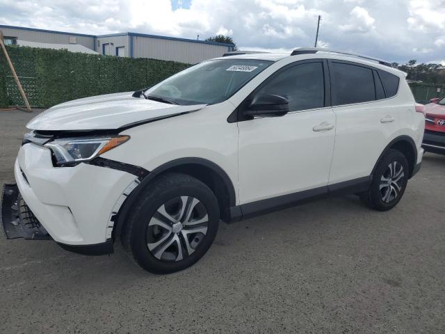 JTMZFREV6JJ204067 - 2018 TOYOTA RAV4 LE WHITE photo 1