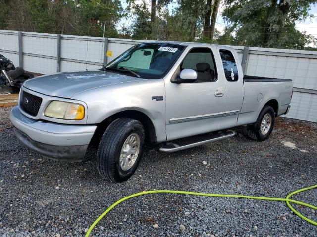 2FTRX17222CA19564 - 2002 FORD F150 SILVER photo 1