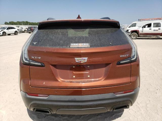 1GYFZER43KF142789 - 2019 CADILLAC XT4 SPORT ORANGE photo 6