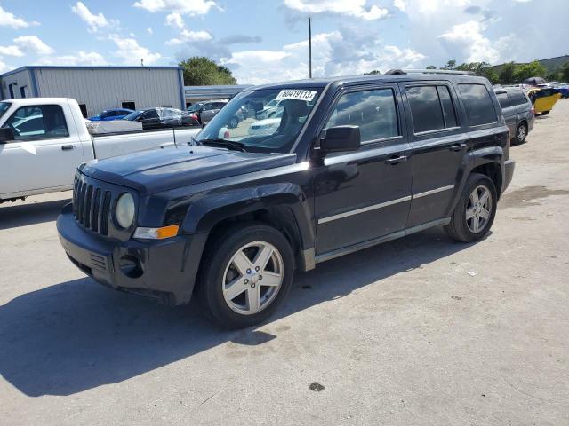 1J4NF4GB8AD561263 - 2010 JEEP PATRIOT LIMITED BLACK photo 1