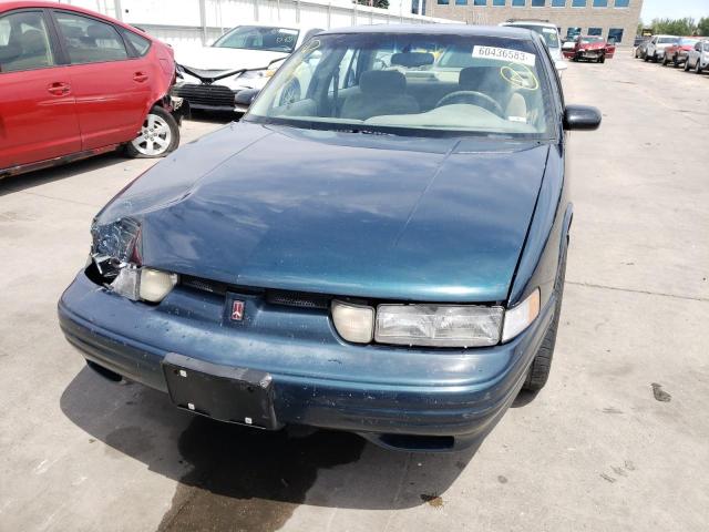 1G3WH52M1VF352458 - 1997 OLDSMOBILE CUTLASS SU SL GREEN photo 5