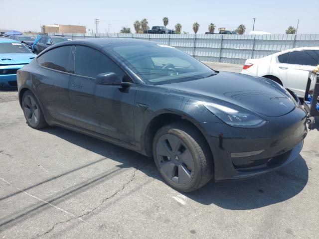 5YJ3E1EA4PF626703 - 2023 TESLA MODEL 3 Սև լուսանկար 4