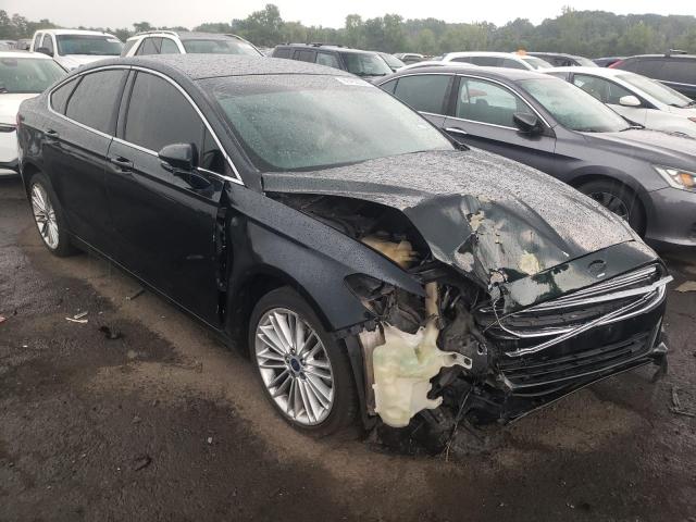 3FA6P0H98ER344620 - 2014 FORD FUSION SE BLACK photo 4