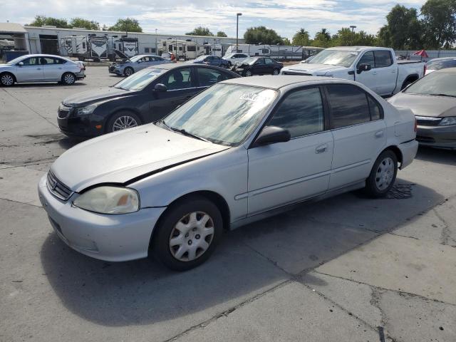 2HGEJ6617YH529038 - 2000 HONDA CIVIC BASE SILVER photo 1