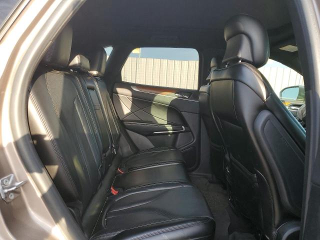 5LMCJ3D92KUL19098 - 2019 LINCOLN MKC RESERVE თაფლისფერი ფოტო 11