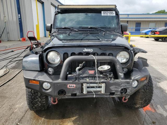 1C4BJWEG9EL274382 - 2014 JEEP WRANGLER U SAHARA BLACK photo 5