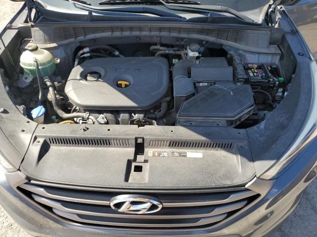 KM8J23A44GU201769 - 2016 HYUNDAI TUCSON SE GRAY photo 11