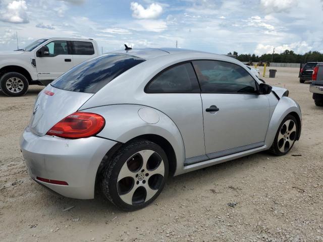 3VWFP7AT5CM616945 - 2012 VOLKSWAGEN BEETLE SILVER photo 3