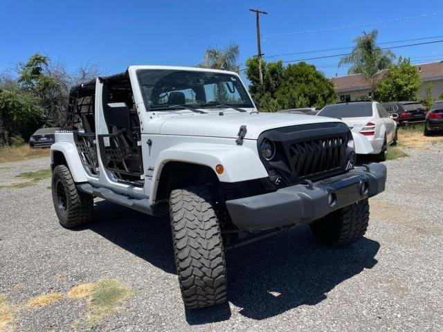 1C4HJWEG3EL283699 - 2014 JEEP WRANGLER U SAHARA WHITE photo 2