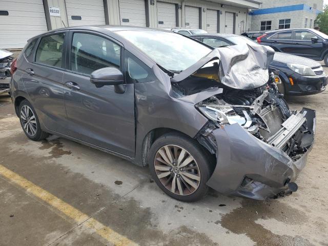 JHMGK5H74HS020676 - 2017 HONDA FIT EX GRAY photo 4