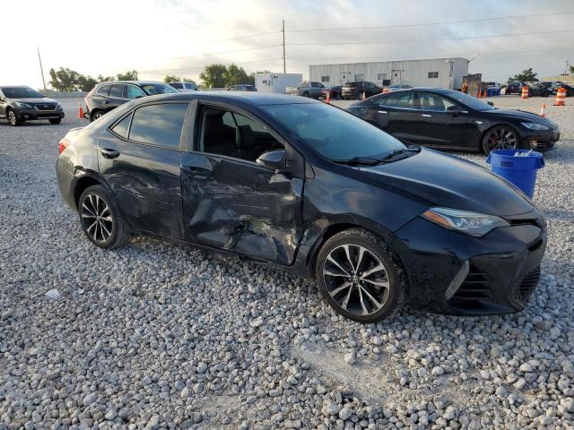 5YFBURHE7HP590829 - 2017 TOYOTA COROLLA L BLACK photo 4