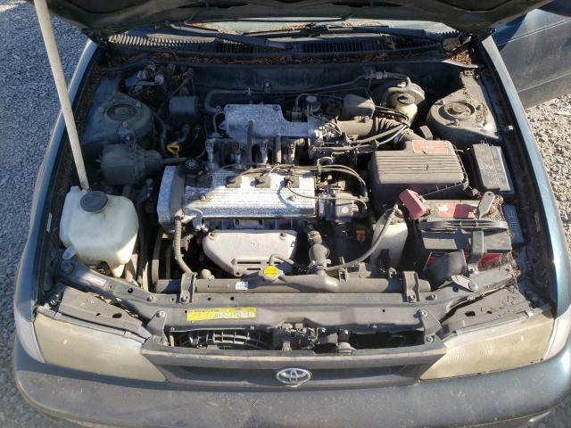 1NXBA02E9VZ652447 - 1997 TOYOTA COROLLA BASE GREEN photo 11