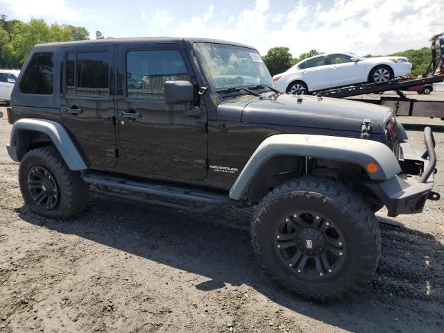 1J4BA6H16BL623494 - 2011 JEEP WRANGLER RUBICON BLACK photo 4