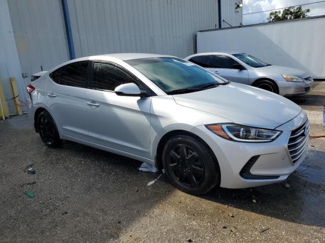 KMHD74LFXJU566998 - 2018 HYUNDAI ELANTRA SE SILVER photo 4