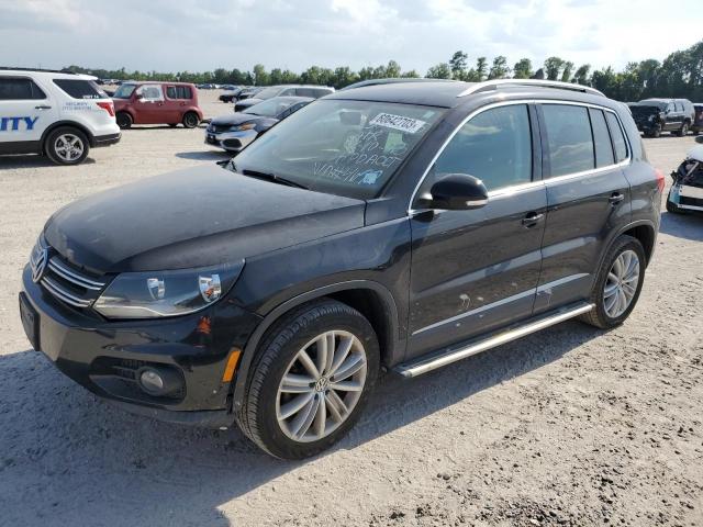 WVGBV3AX4EW544699 - 2014 VOLKSWAGEN TIGUAN S BLACK photo 1