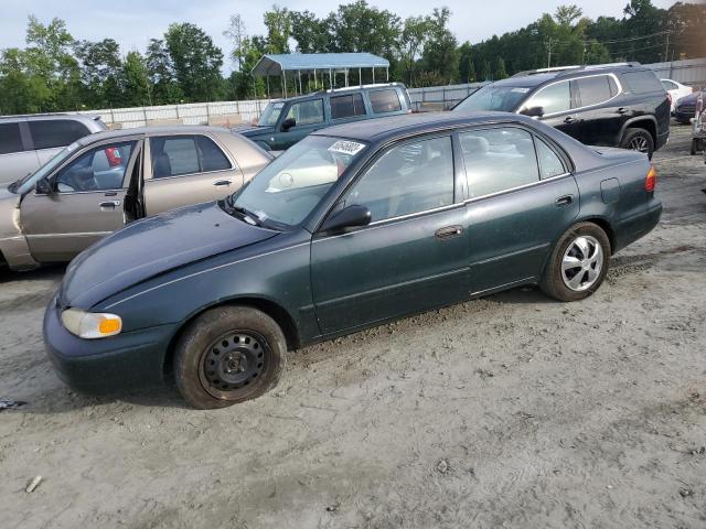 1Y1SK5288YZ433782 - 2000 CHEVROLET GEO PRIZM BASE CHARCOAL photo 1