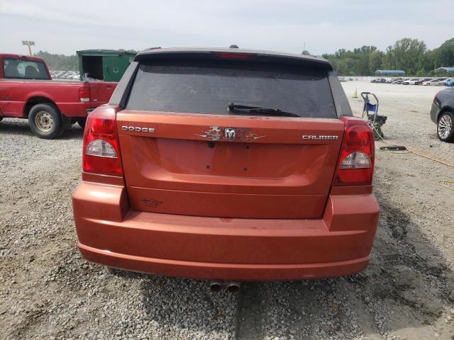 1B3CB3HA5AD569427 - 2010 DODGE CALIBER MAINSTREET ORANGE photo 6