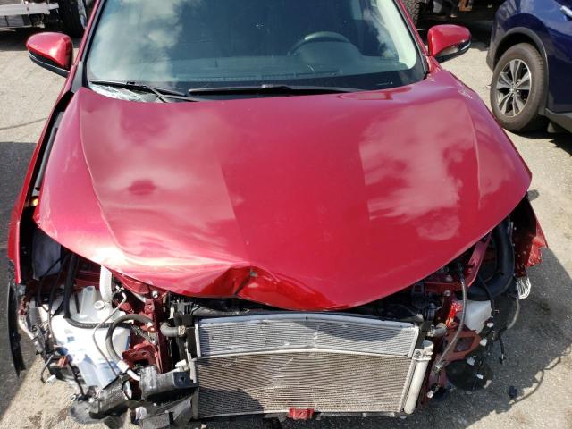 JTMRJREV5JD215719 - 2018 TOYOTA RAV4 HV LE RED photo 12