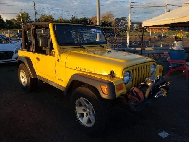 1J4FA69S14P778684 - 2004 JEEP WRANGLER / RUBICON YELLOW photo 1