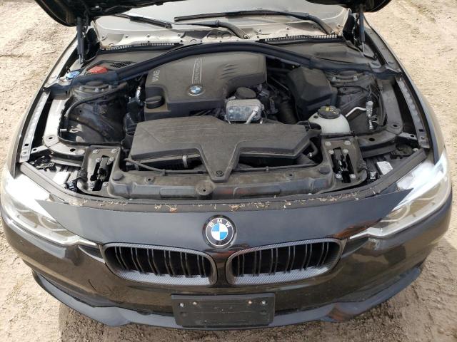 WBA8A3C55JA491540 - 2018 BMW 320 XI BLACK photo 11