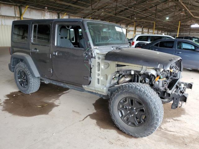 1C4BJWDG9JL854436 - 2018 JEEP WRANGLER U SPORT GRAY photo 4