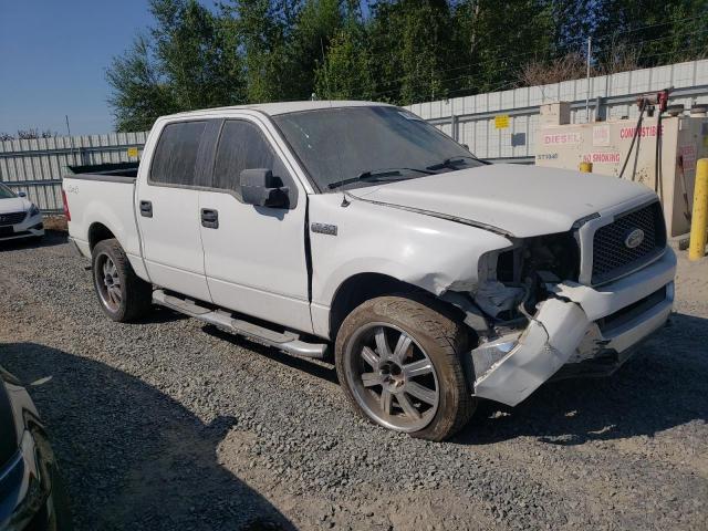 1FTPW14585KE20450 - 2005 FORD F150 SUPERCREW WHITE photo 4