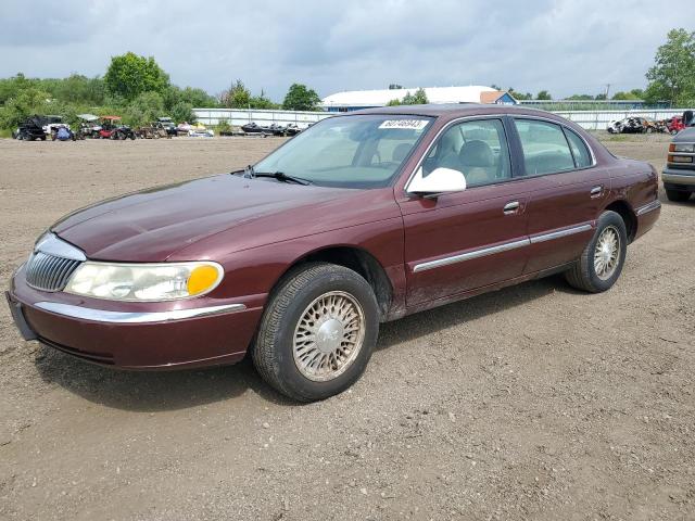 1LNHM97V41Y682375 - 2001 LINCOLN CONTINENTA MAROON photo 1