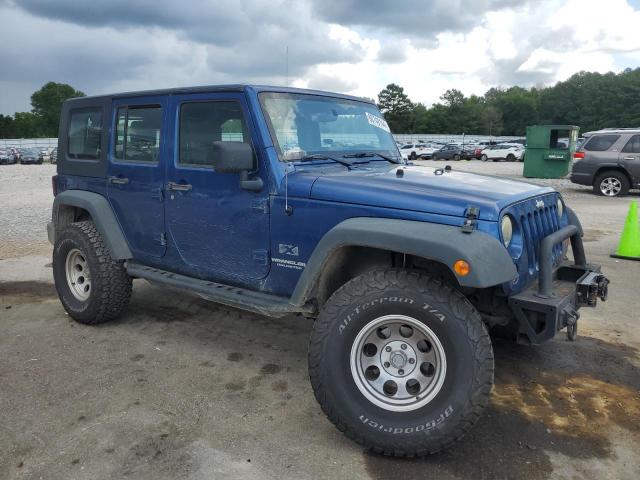 1J4GA39119L742373 - 2009 JEEP WRANGLER U X BLUE photo 4