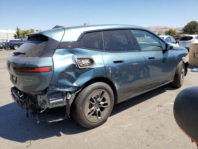WB523CF03PCL19874 - 2023 BMW IX XDRIVE50 TEAL photo 3